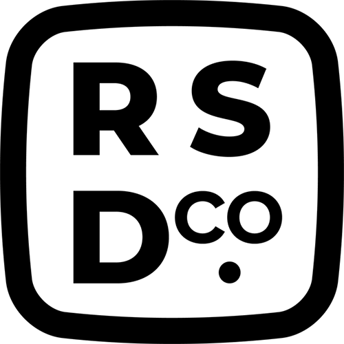 RS Design Co. logo. It is a rounded square with text inside that says, "RS" on the top line and "D CO" on the bottom. The "CO" is smaller and aligned above a dot in the lower right corner.